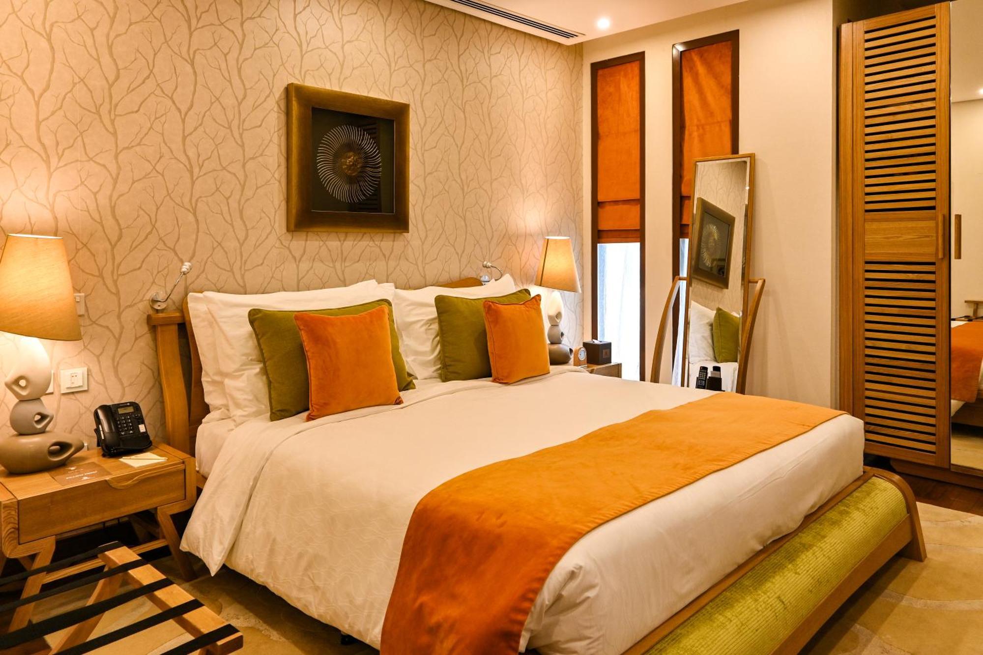 Palavra Resort Manama Exterior foto A bedroom at the Taj Bengal