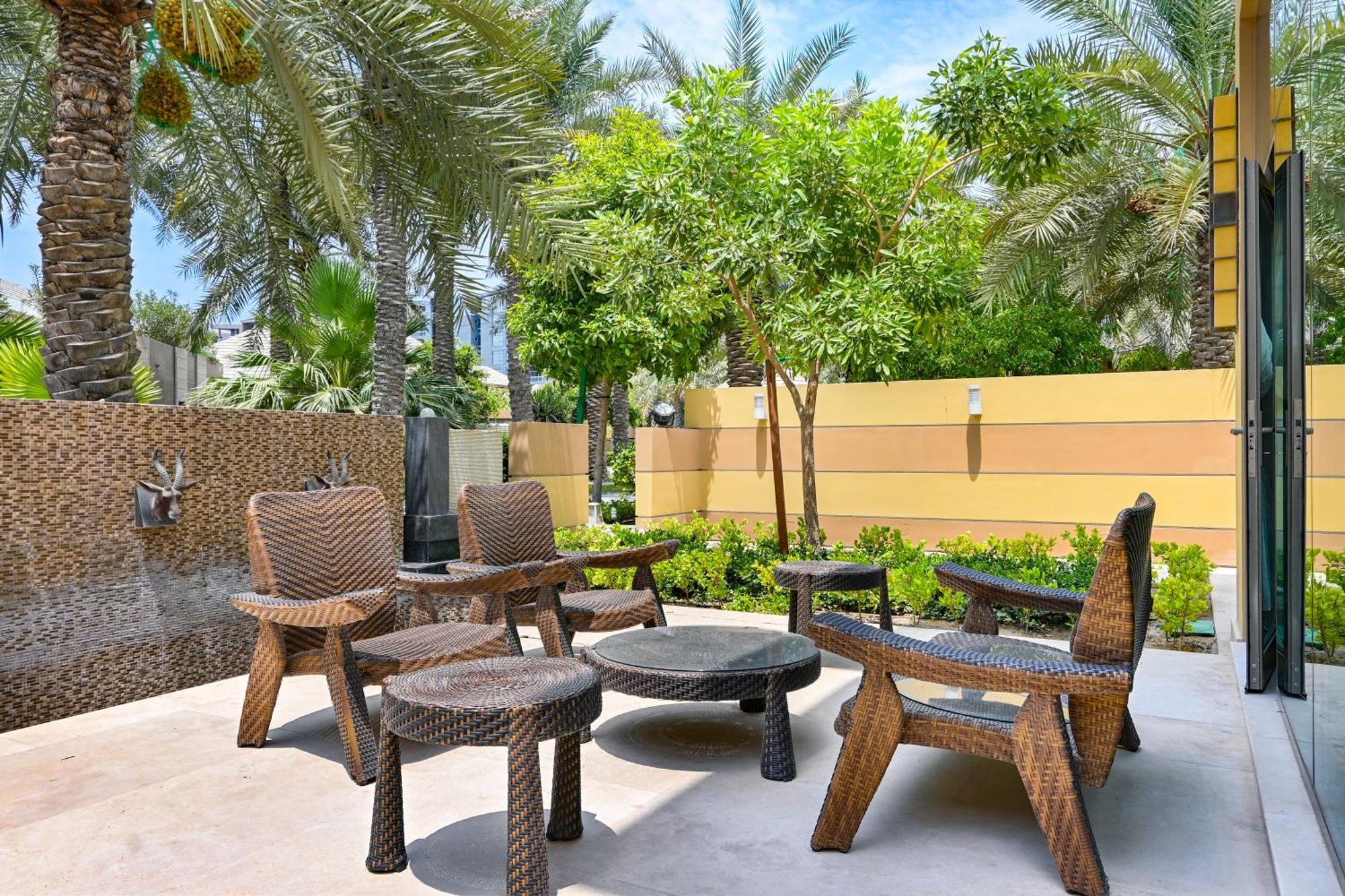Palavra Resort Manama Exterior foto The Palm Beach Hotel
